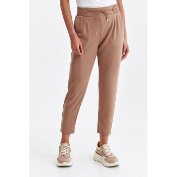 Pantaloni crop cu buzunare oblice