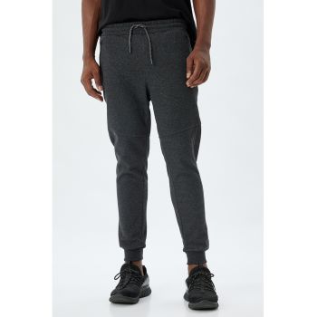 Pantaloni de trening cu buzunare cu fermoar