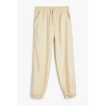 Pantaloni de trening cu buzunare laterale