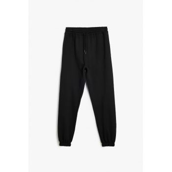 Pantaloni de trening cu buzunare laterale