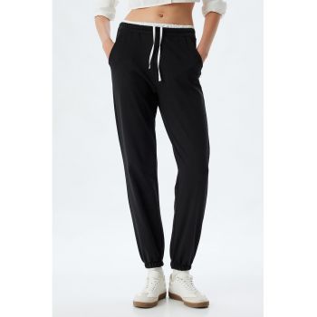 Pantaloni de trening cu buzunare oblice