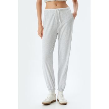 Pantaloni de trening cu buzunare oblice