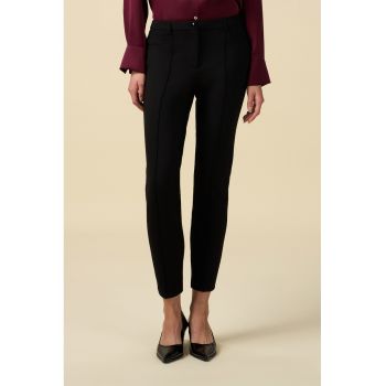 Pantaloni crop cambrati