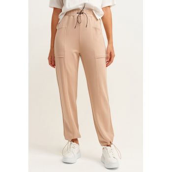 Pantaloni conici cu talie elastica