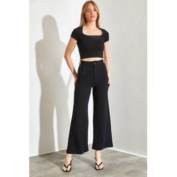 Pantaloni crop evazati