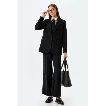 Pantaloni eleganti cu buzunare oblice