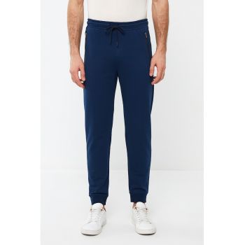 Pantaloni de trening cu buzunare cu fermoar