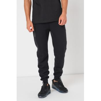 Pantaloni de trening cu buzunare cu fermoar