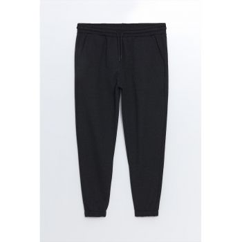 Pantaloni de trening cu buzunare oblice